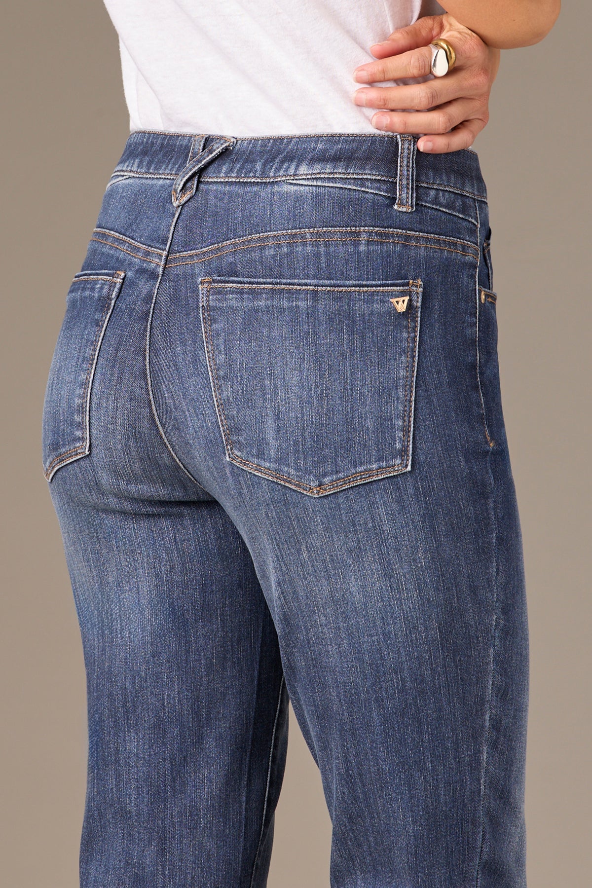 Logan High Rise Distressed Hem Vintage Skinny Jeans