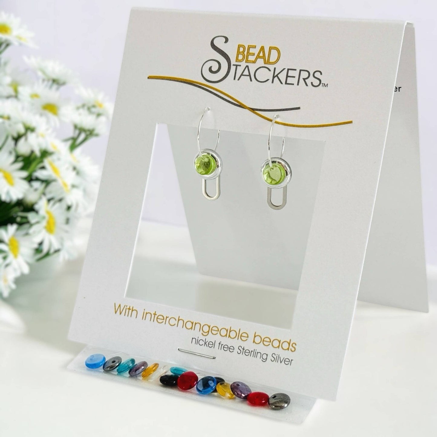 PC25  - Earrings come with 9 interchangeable colours. 