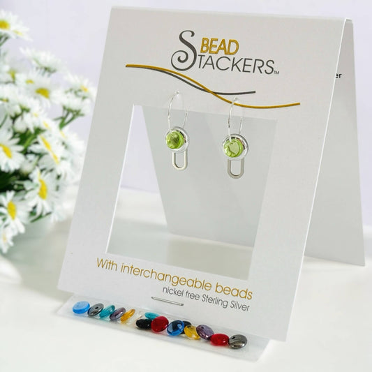 PC25  - Earrings come with 9 interchangeable colours. 