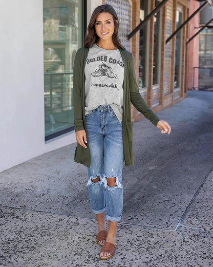 High-Rise Girlfriend Jeans in Distressed Mid-Wash