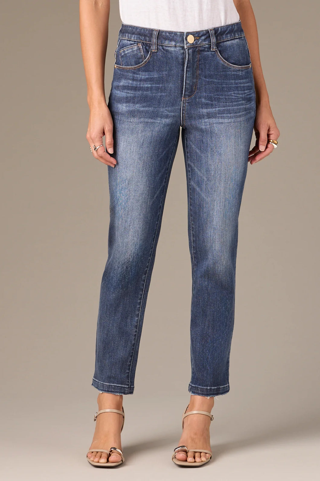 Logan High Rise Distressed Hem Vintage Skinny Jeans
