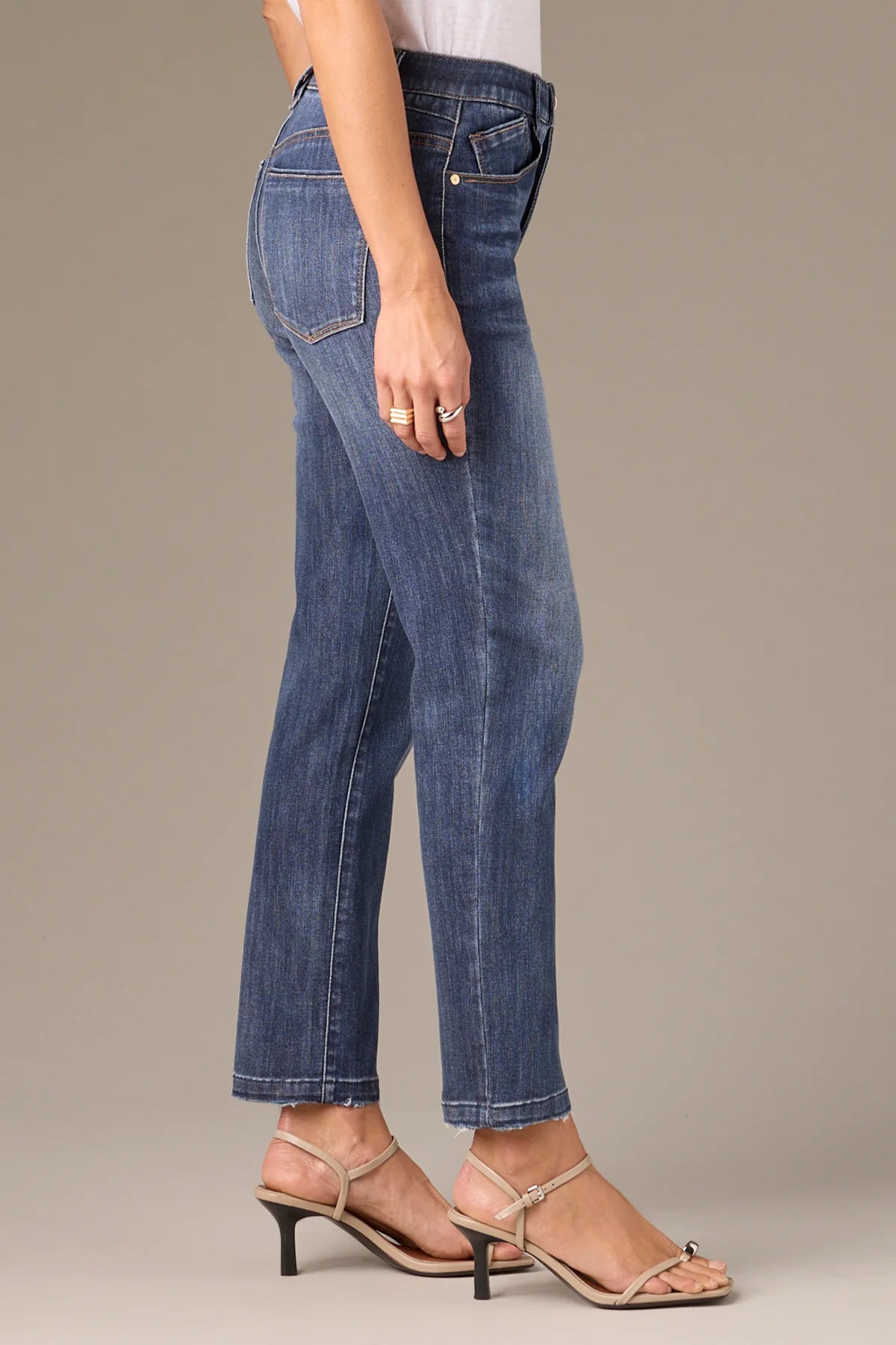 Logan High Rise Distressed Hem Vintage Skinny Jeans