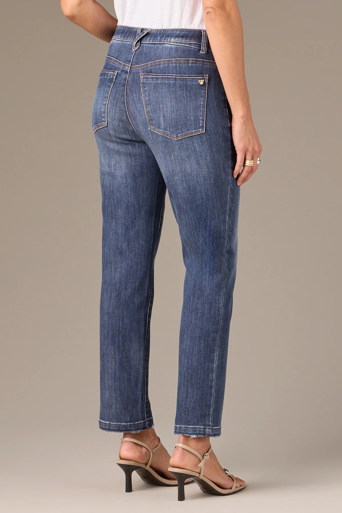 Logan High Rise Distressed Hem Vintage Skinny Jeans
