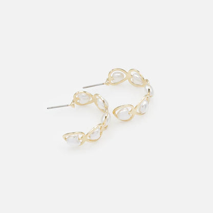 Gold half-circle earrings with heart-shaped pearls