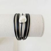 Single Multi-Strand Bracelet with Metallic Centerpiece